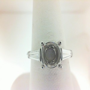 White 18 Karat Ring With 2=0.43Tw Baguette Diamonds  Serial #: 662710