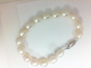 14 Karat White Gold  Bracelet With  Fresh Water Pearls  Length: 7