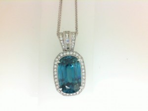 White 18 Karat Necklace With 0.51Tw Round G Si1 Diamonds  0.13Tw Baguette G Si1 Diamonds And 15.22 Twt Blue Zircon