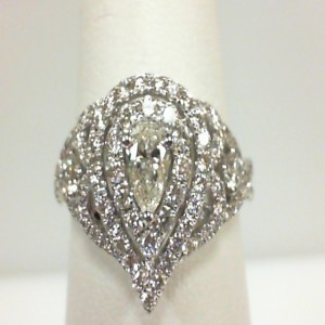Forevermark: 18 Karat White Gold Ring With One 0.30Ct Forevermark Pear J Si2 Diamond And 109=0.95Tw Round Diamonds