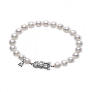 Mikimoto: 18 Karat White Gold Bracelet With 22=6.50-7.00mm A Quality Round Akoya Pearls 7 Inch
