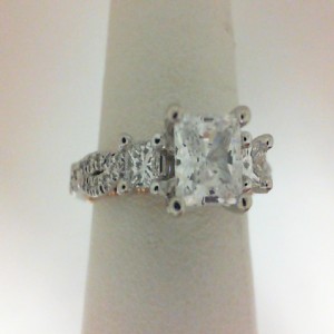Verragio: 18 Karat White/Rose Gold Couture Semi-Mount Ring With 0.65Tw Princess & Round Diamonds
For 5.5mm Pc Center