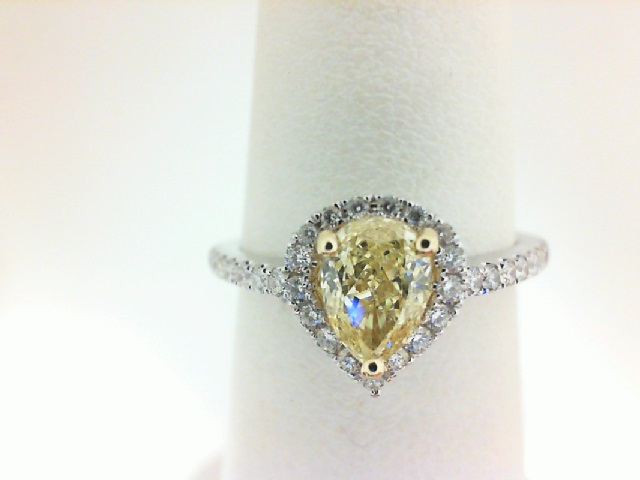 18 Karat White Gold  Ring With One 0.61Ct Pear SI1 Yellow Diamond And 33=0.26Tw Round G/H SI1-2 Diamonds
