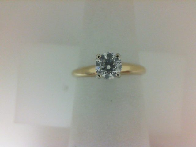 14 Karat yellow gold 0.54Ct Round J I1 Diamond