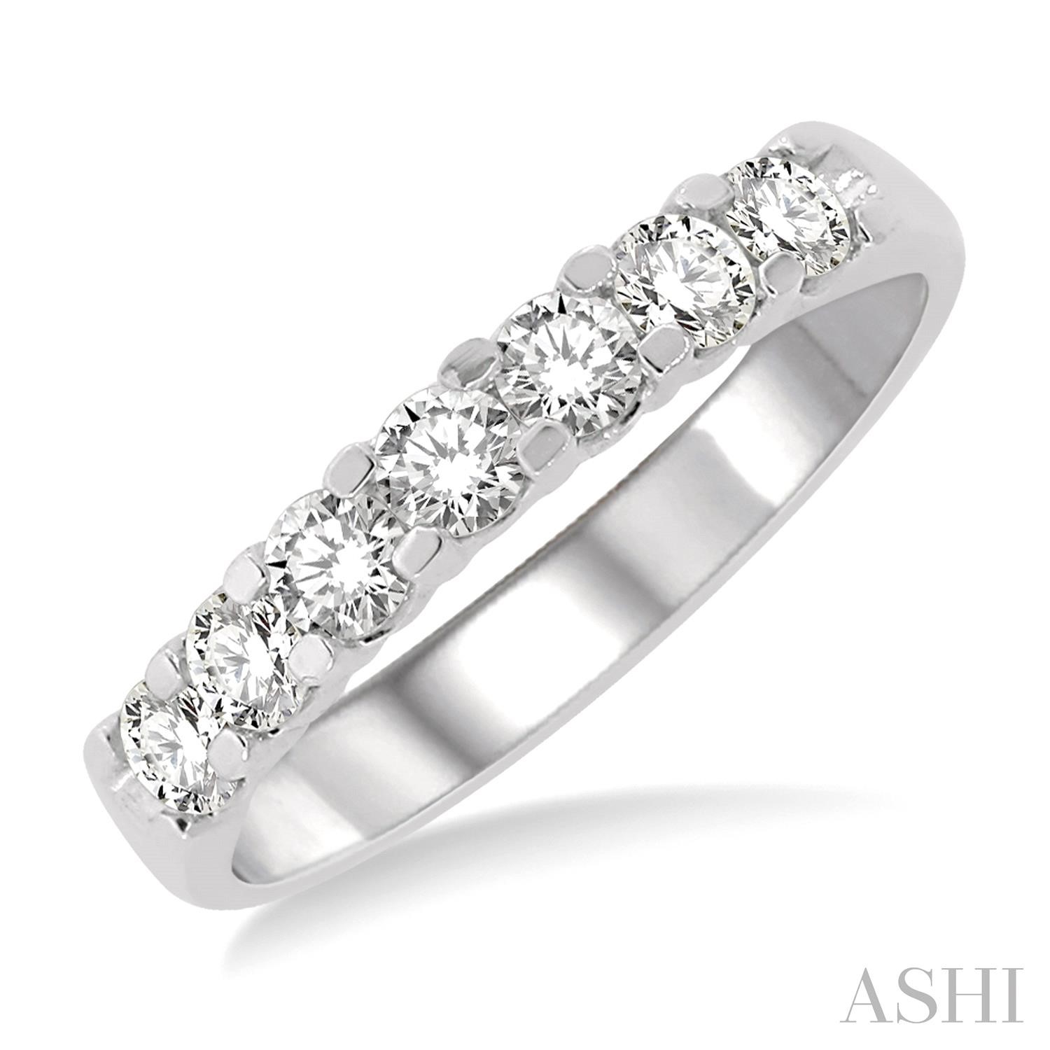 14 Karat White Gold Shared Prong Wedding Band With 7=0.75Tw Round Diamonds
Ring Size: 6.5