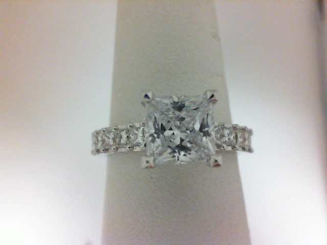 Karl Lagerfeld: White 18 Karat Semi Mount Ring With .95Tw Princess Diamonds
Name: Pyramid Kollection