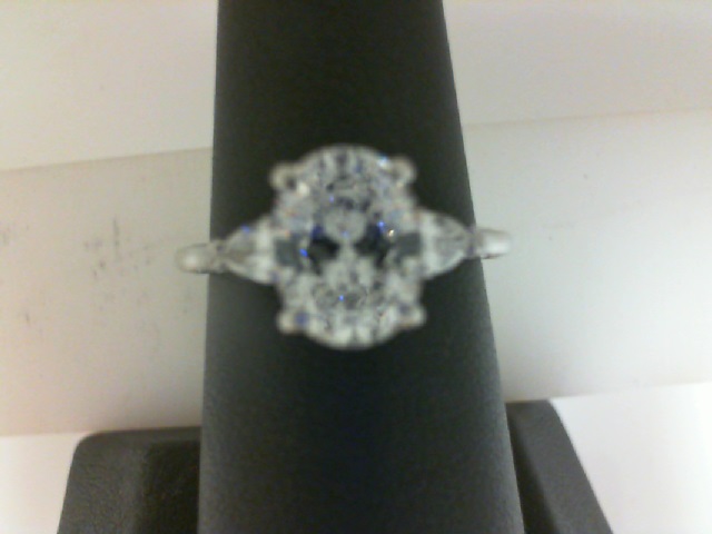 Tacori: 18 Karat White Gold Semi-Mount Ring With .37Tw Pear Diamonds
8.5x6.5mm Center