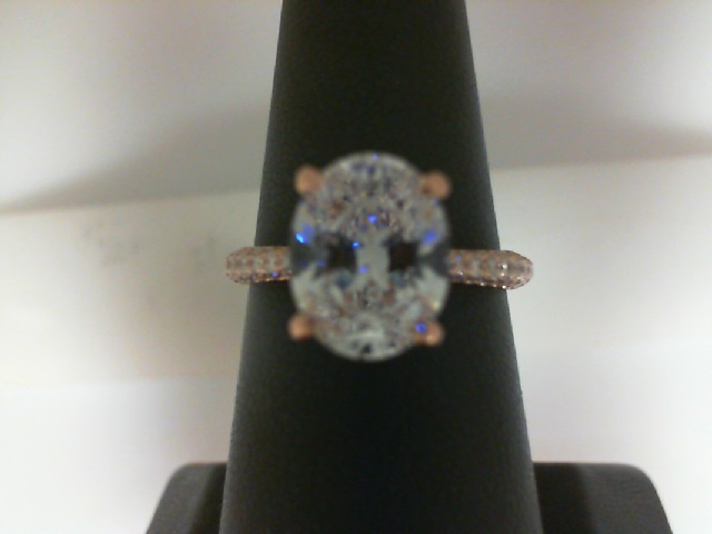 Tacori: 18 Karat Rose Semi-Mount Ring With 0.56Tw Royal T Round Diamonds
For 9.5mmx7.5mm Center