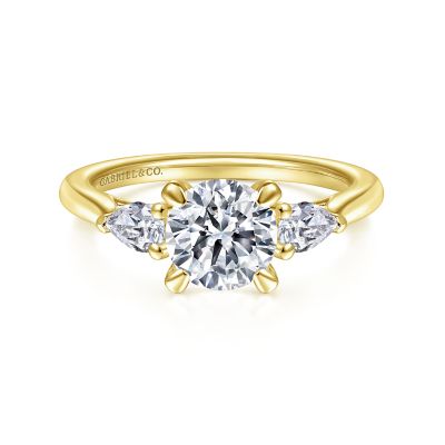Gabriel & Co: 14 Karat Yellow Gold Three Stone Semi-Mount Ring With 2 Pear G/H SI1-2 Diamonds At 0.28 Total Diamond Weight  
*Setting only, center stone not included