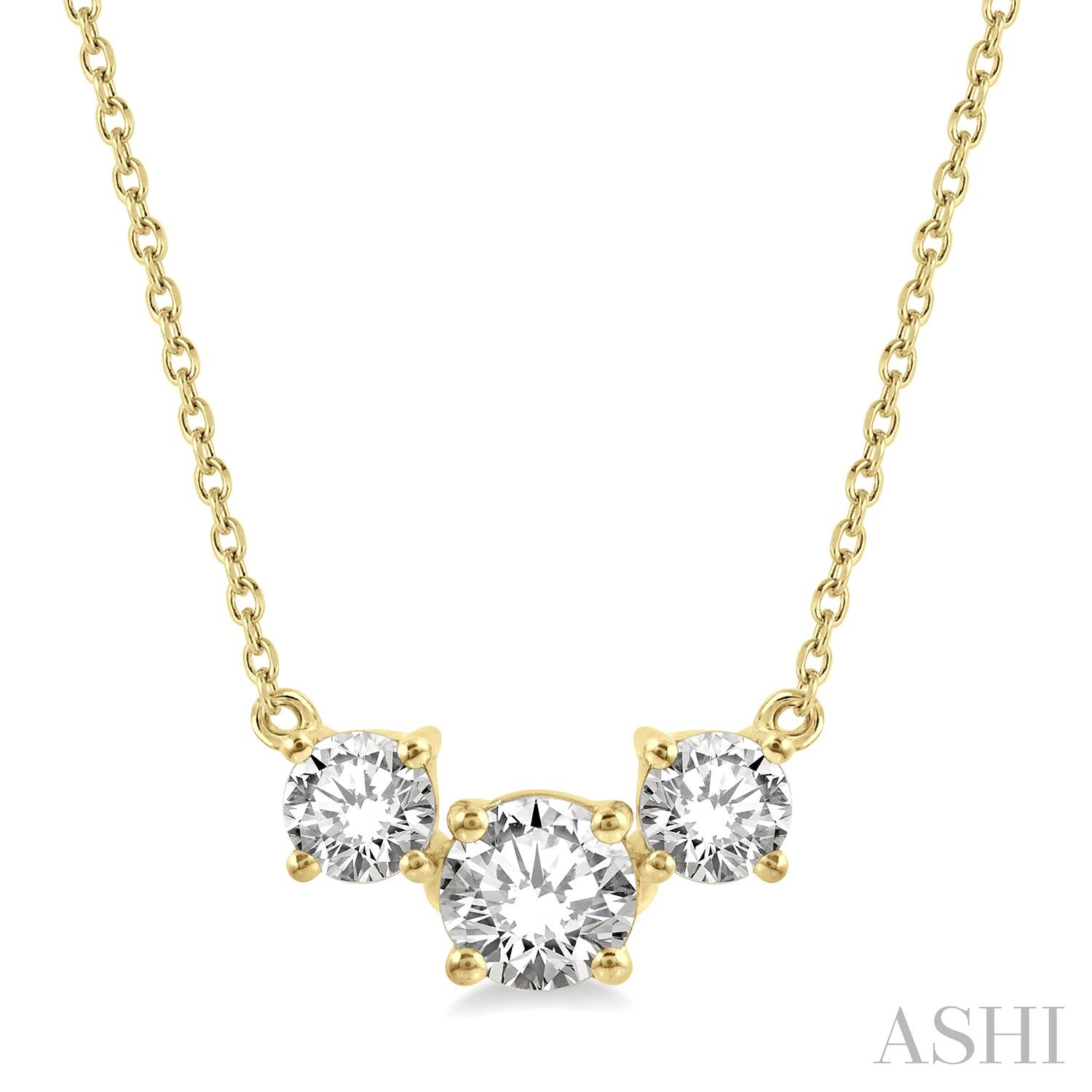 14 Karat Yellow Gold 3 Stone Diamond Necklace 0.75CTW
18 Inch Chain