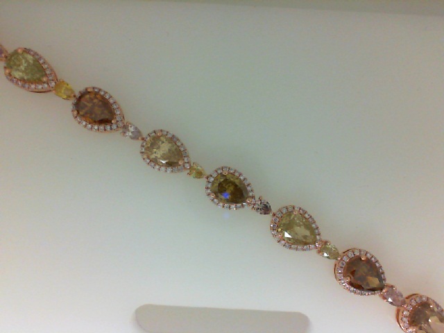 18 Karat Rose Gold Bracelet With 28=10.10Tw Pear Diamonds And 288=1.01Tw Round Pink Diamonds
Serial #: 572041