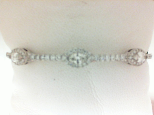 Forevermark: 18 Karat White Gold Bangle Bracelet With Three Forevermark Marquise Diamonds = 0.63 Ct Tw And 0.68Tw Round Non Forevermark Diamonds