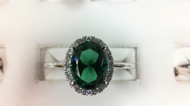 14 Karat White Gold Fashion Ring With 20=0.13Tw Round Diamonds And One 1.12Ct Oval Created Emerald