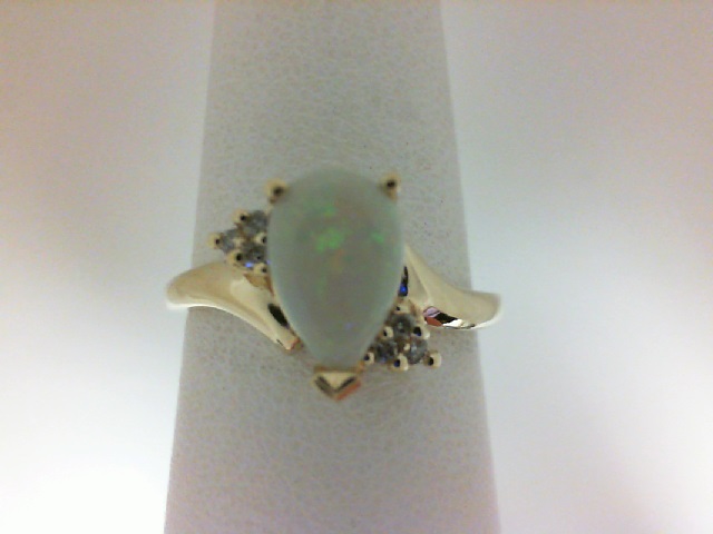 14 Karat Yellow Gold Fashion Ring With One 9.00X6.00mm Pear Opal And 6=0.06Tw Round Diamonds