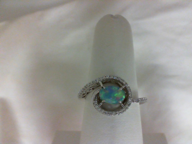 14 Karat White Gold Fashion Ring With One 0.44Ct Oval  Australian Opal And 42=0.19Tw Roundl H/I Si1-2 Diamonds