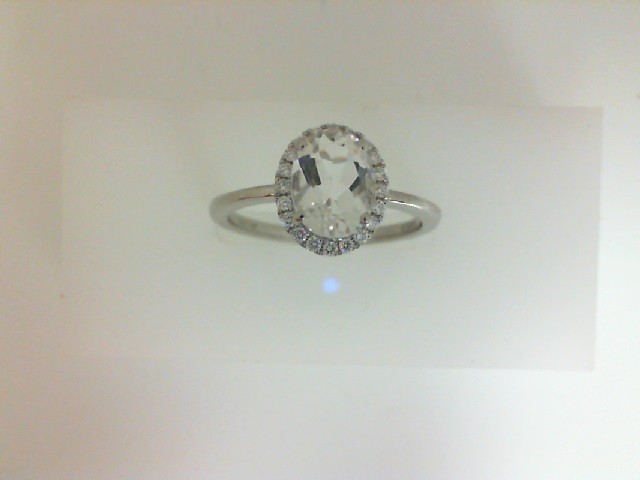 14 Karat White Gold Fashion Ring With One Oval White Topaz And 20=0.12Tw Round Diamonds
Ring Size: 7.25