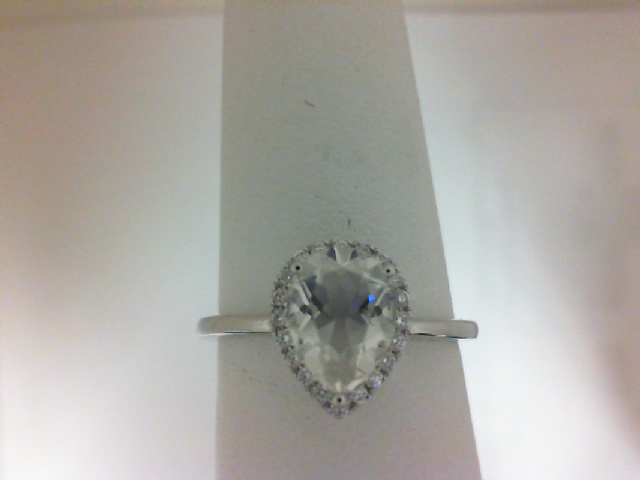 14 Karat White Gold Fashion Ring With 20=0.12Tw Round Diamonds And One 1.17Ct Pear White Topaz