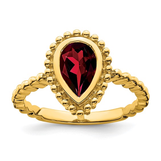 14 Karat Yellow Gold Pear Shape Garnet Bezel Set Beaded Ring