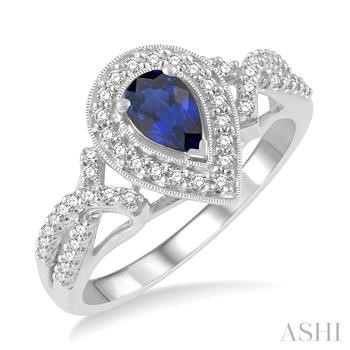 14 Karat White Gold 6 X 4 Pear Sapphire And Diamond 0.20 Ct Halo Ring
