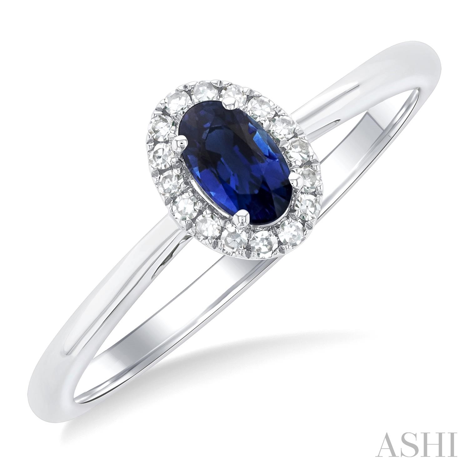 10 Karat White Gold Ring With 5X3mm Oval Sapphire And Diamonds 0.06CTW