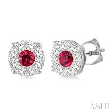 Captivate her with the dazzling and stunning look of these mesmeric diamond and Ruby earrings. Beautifully crafted in luminous 14 karat white gold these gorgeous lovebright diamond earrings features 16 round cut diamonds and 2 round cut Ruby, perfectly in