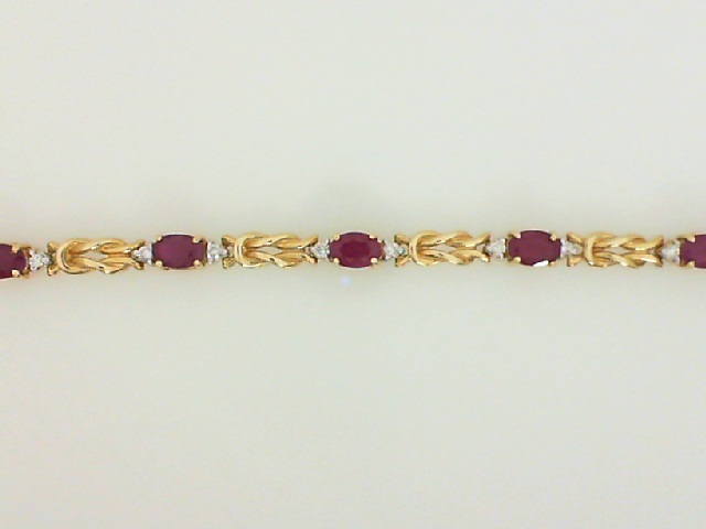 14 Karat Yellow Gold 6.60Ctw Ruby & .50Ctw Diamond Bracelet
