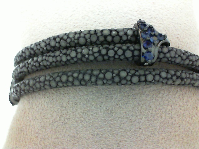 Sting HD: Grey Double Sting Ray Strand Bracelet W/ Silver Accents/ Black Plating & 16 Round Sapphires
Size 7.75