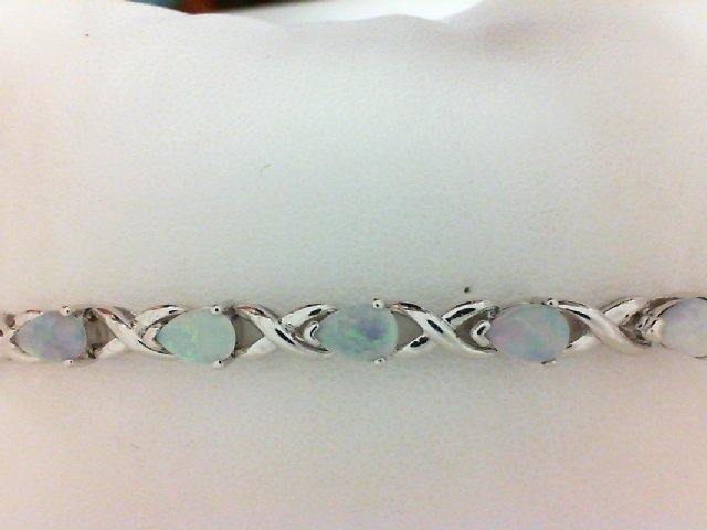 Sterling Silver Opal Bracelet With 16=3.68Tw Pear Opals
7.5