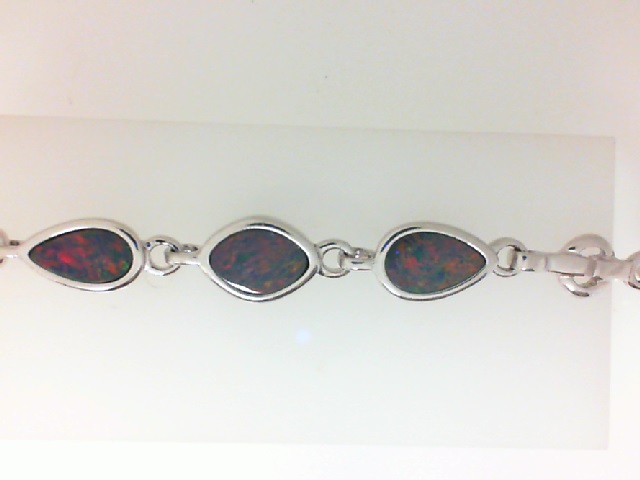 Sterling Silver Bracelet With Cabochon Opal Doublets
Length: 6.5-7.5