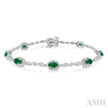 10 Karat White Gold Tennis Bracelet With 8 5mm X3mm Oval Emerald Gemstones And Round Diamonds 0.05Ctw