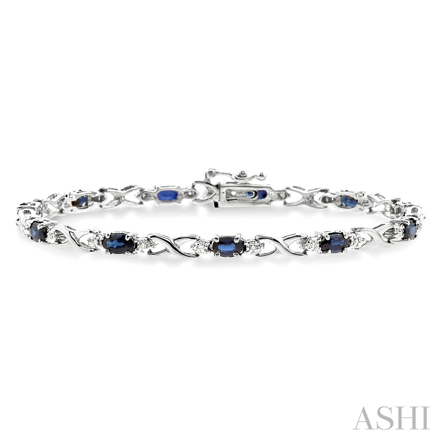 10 Karat White Gold 5mm x 3mm Oval Shape Sapphire Gemstones And Diamond 0.10Ctw Bracelet
7 Inch