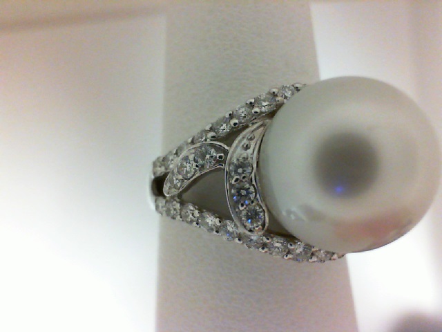 18 Karat White Gold Ring With One 11.80mm Round Pearl And 0.82Tw Round Diamonds
Name: Ackerman Signature Collection
