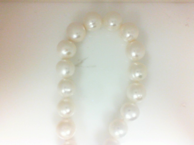 Sterling Silver 11-12 MM Freshwater Pearl  Strand
Length: 17.5