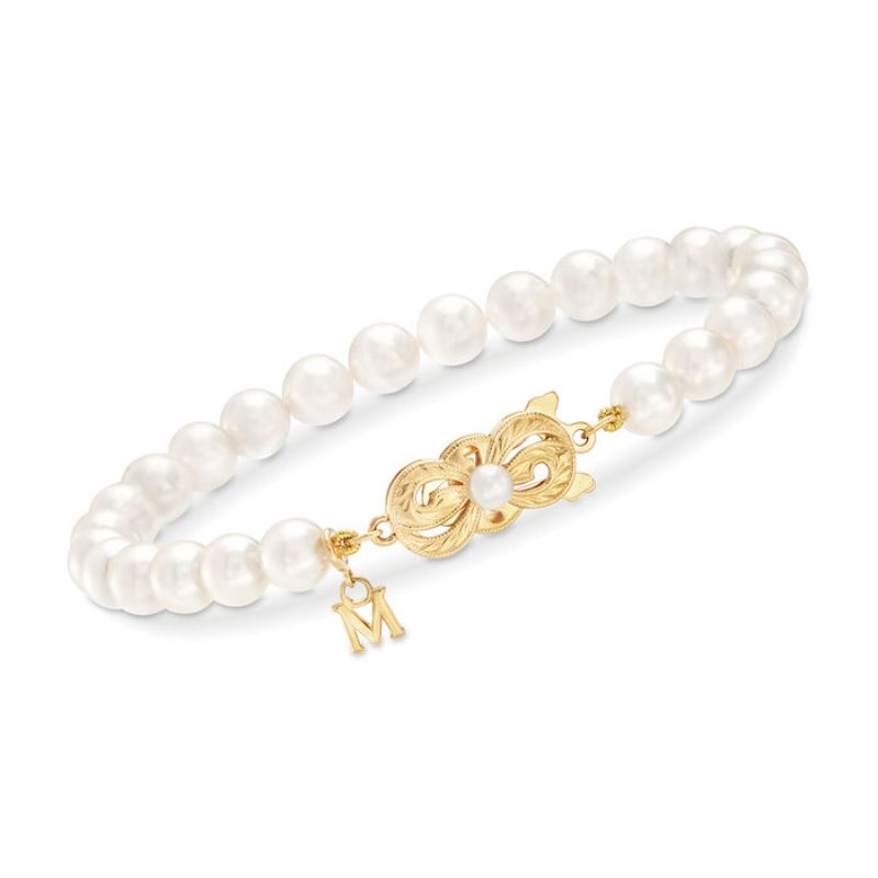 Mikimoto: 18 Karat Yellow Gold Bracelet With 21=7.0-7.5mm A Quality Akoya Pearls 7 Inch