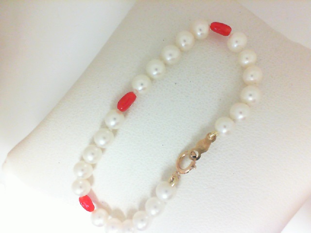 14 Karat Yellow Gold Freshwater Pearl Bracelet With 3 Coral Beads 5.5 Inch