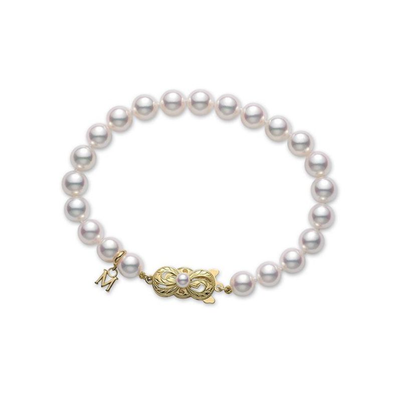 Mikimoto: 18 Karat Yellow Gold Bracelet With  6.5 - 7.0 mm A Quality Pearl  7 Inch
