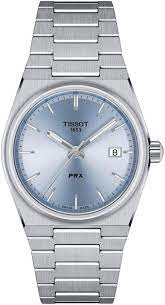 Tissot Stainless Steel PRX 35mm  Quartz Watch (T1372101135100)
35mm stainless steel tonneau-shaped case
Scratch-resistant sapphire crystal
Light blue sunray dial with a date window at 3 o’clock and silver-tone hands and indexes filled with SuperLuminov