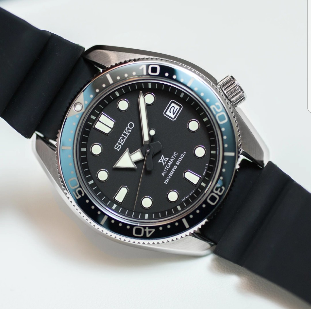 Seiko Luxe: Stainless Steel Automatic Watch
Name: Prospex Divers 200m
Name of Bracelet: Silicone
Clasp: Buckle
Dial Color: Black dial 
Bezel: Black