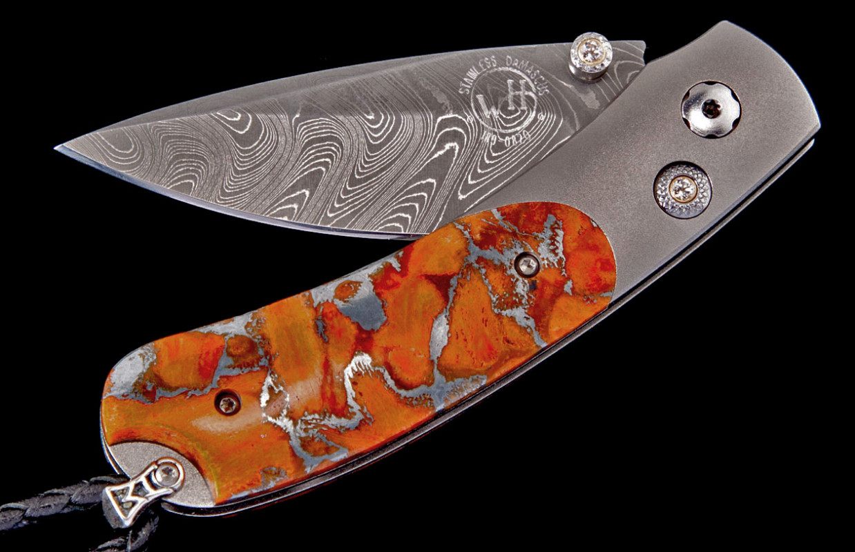 William Henry  Titanium Inlaid With Zinc Matrix Apple Coral  And Boomerang Damascus Blade With White Topaz