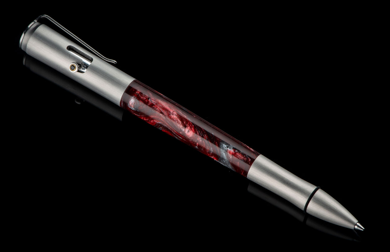 William Henry: Ba2 Ruby BoltII Pen
Frame: Ruby Lava Resin
Accents: Stainless Steel