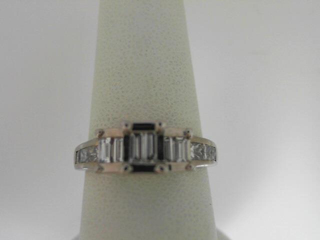Estate 14 Karat White Gold Princess And Baguette Cut Diamond Ring size 7 (Cannot be sized)
Very Good Condition