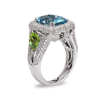 Charles Krypell 18 Karat White/Yellow Fashion Ring With 281=1.80Tw Round H/I VS2 Diamonds, 2= Pear Peridots And Cushion Blue Topaz
Ring Size: 6.5