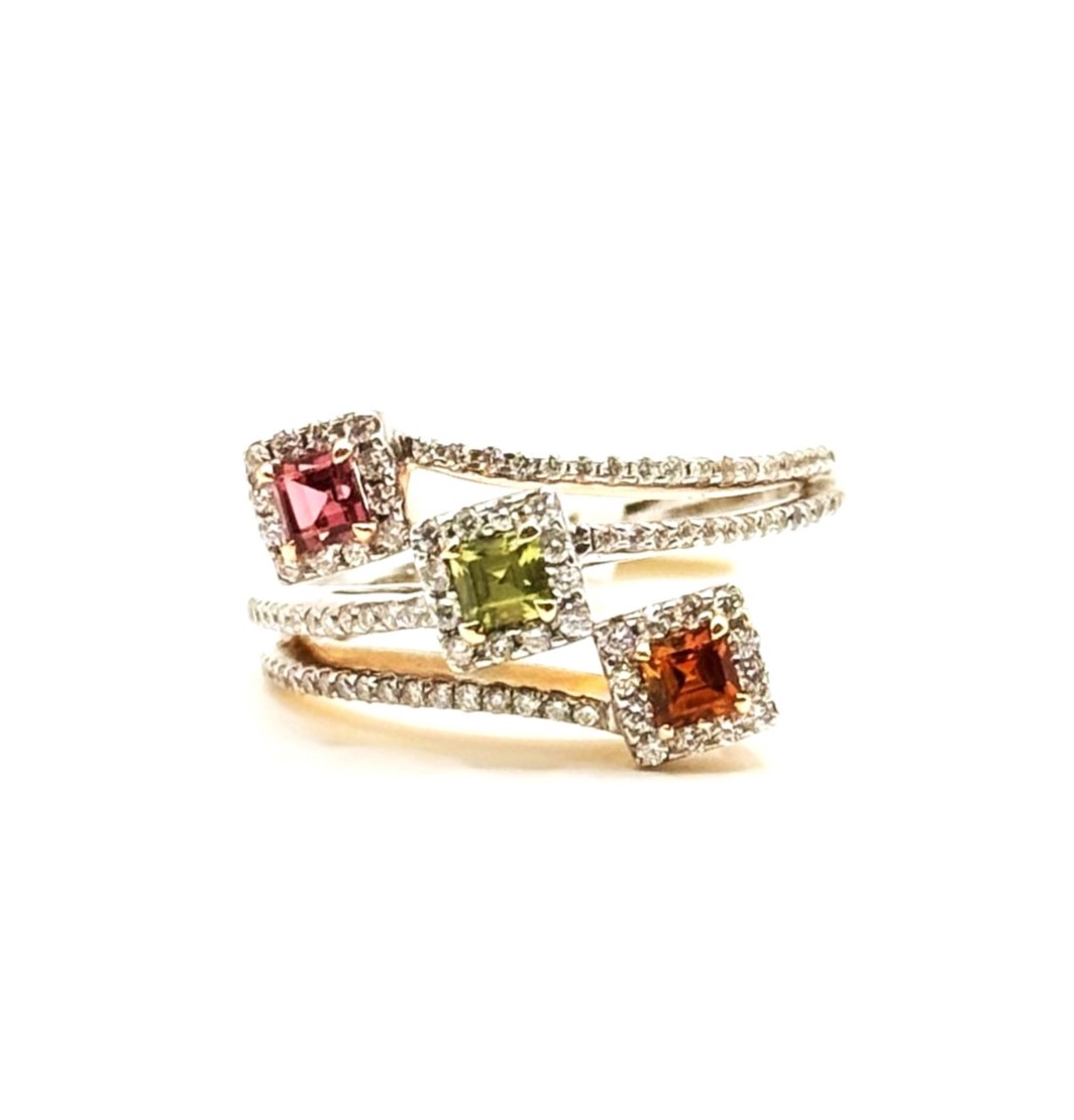 18 Karat Tri-Gold Ring With 98=0.38Tw Round Diamonds And 3=0.63Tw Princess Tourmaline,
Peridot And Citrine
